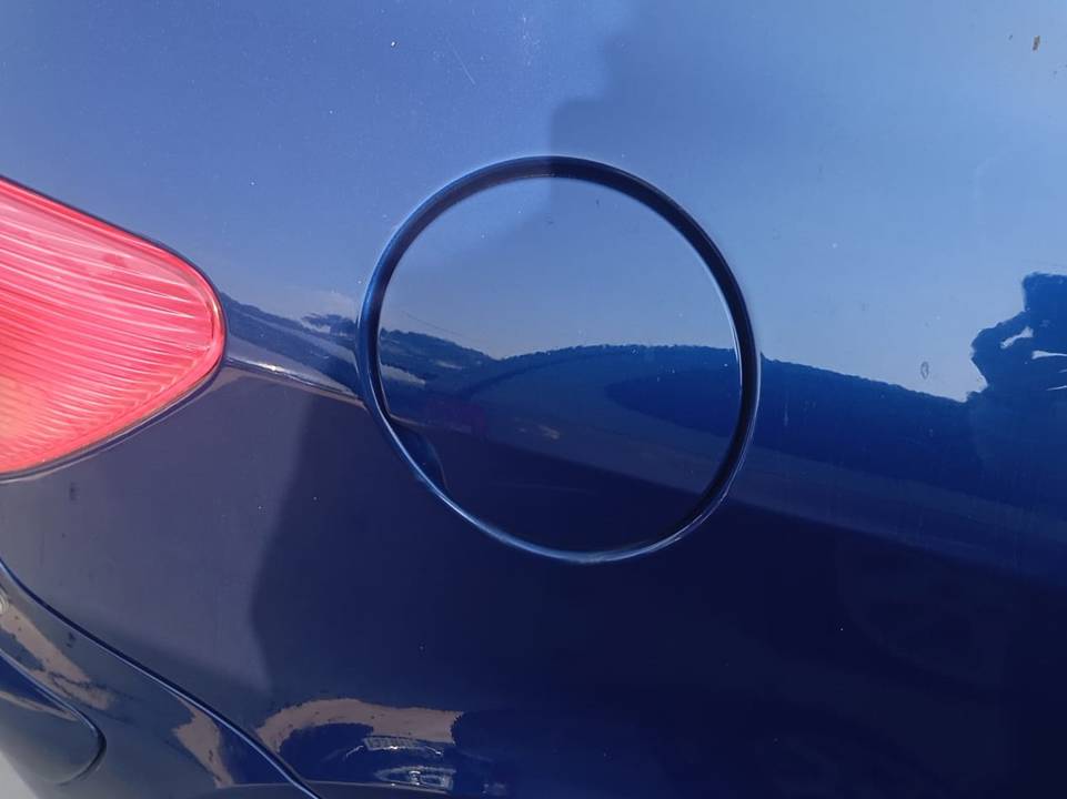 TAPA EXTERIOR COMBUSTIBLE