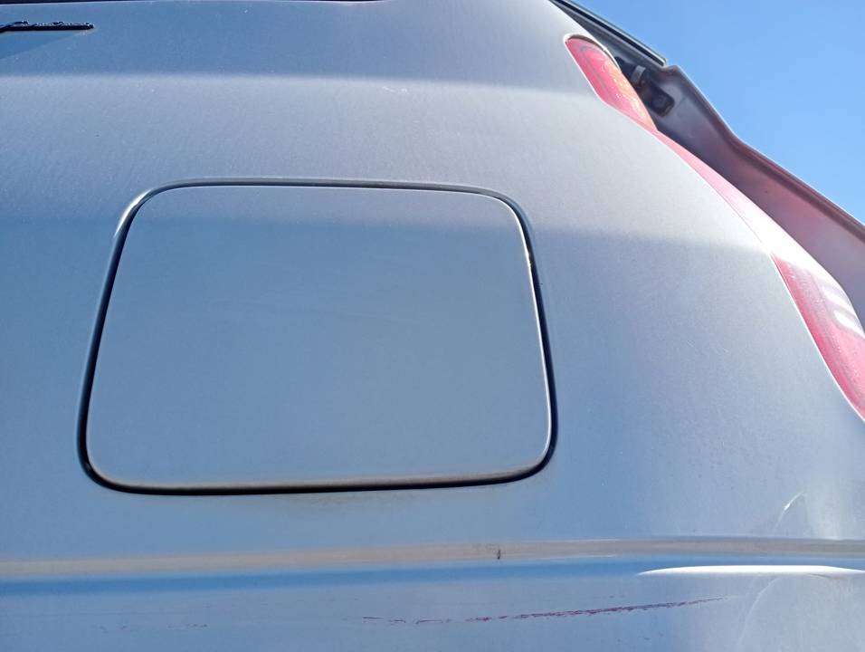 TAPA EXTERIOR COMBUSTIBLE