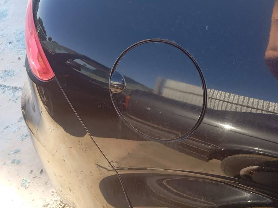 TAPA EXTERIOR COMBUSTIBLE