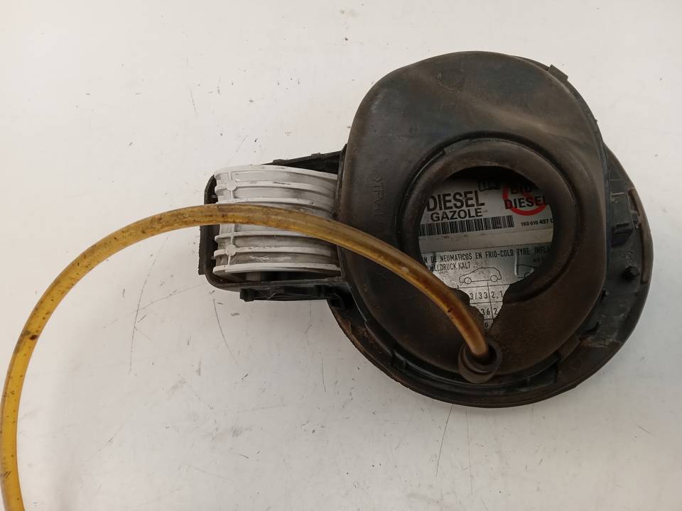 TAPA EXTERIOR COMBUSTIBLE
