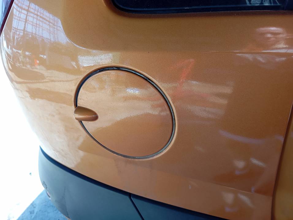 TAPA EXTERIOR COMBUSTIBLE