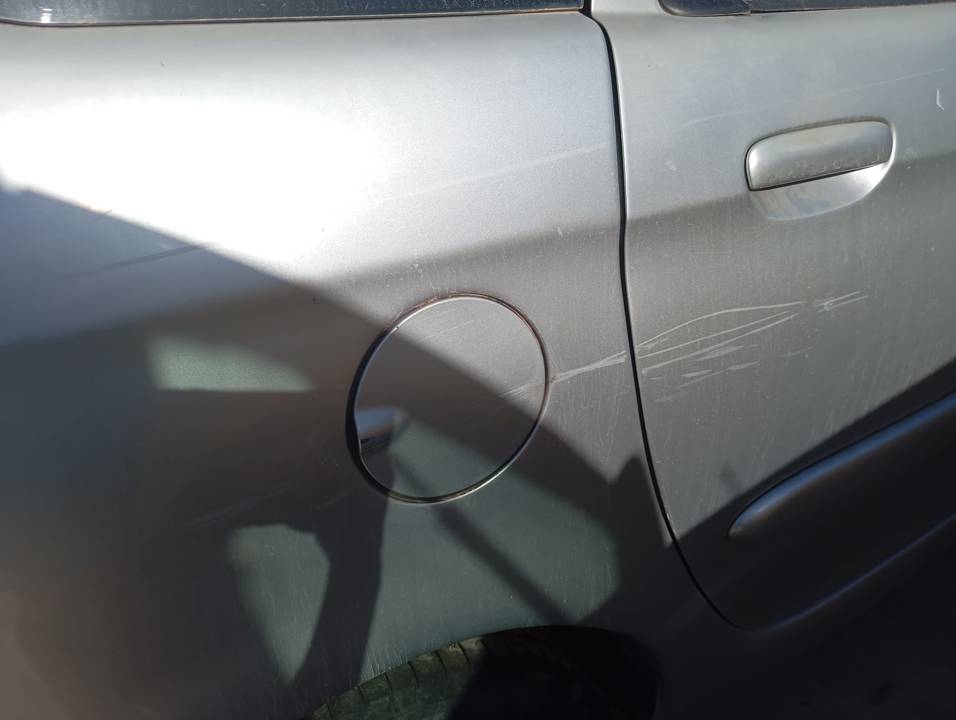 TAPA EXTERIOR COMBUSTIBLE