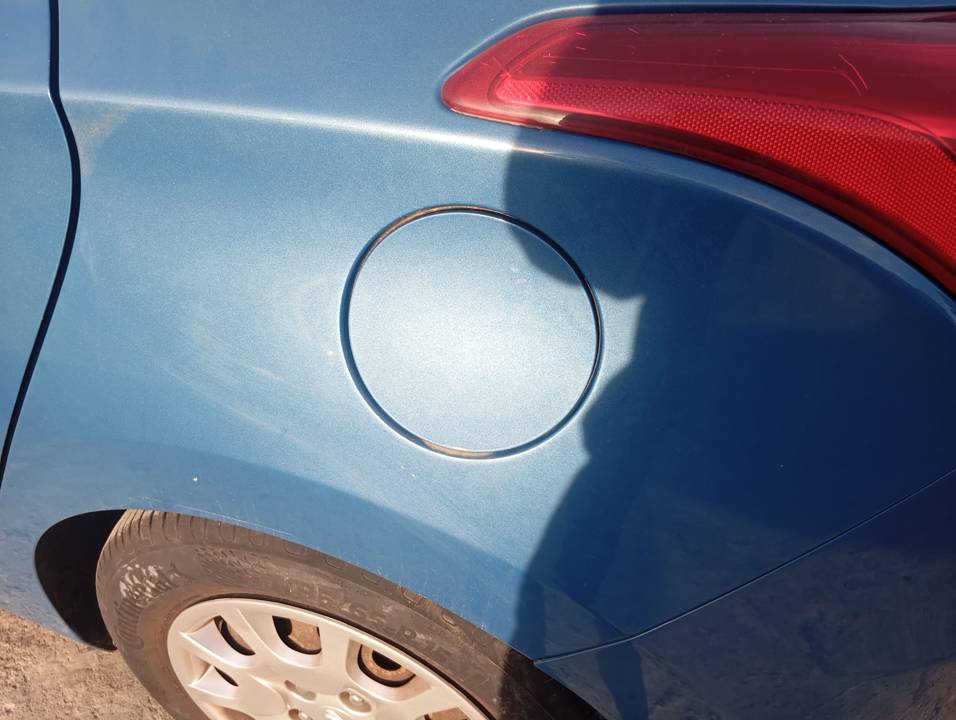 TAPA EXTERIOR COMBUSTIBLE