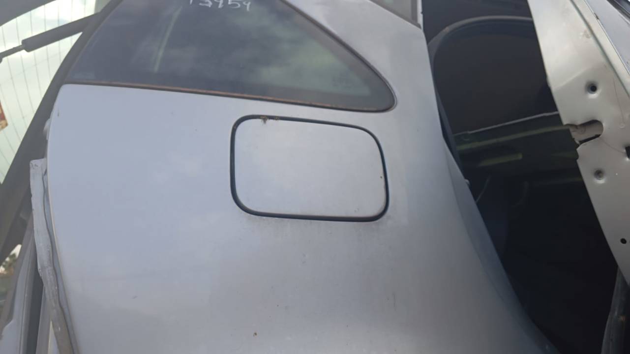 TAPA EXTERIOR COMBUSTIBLE