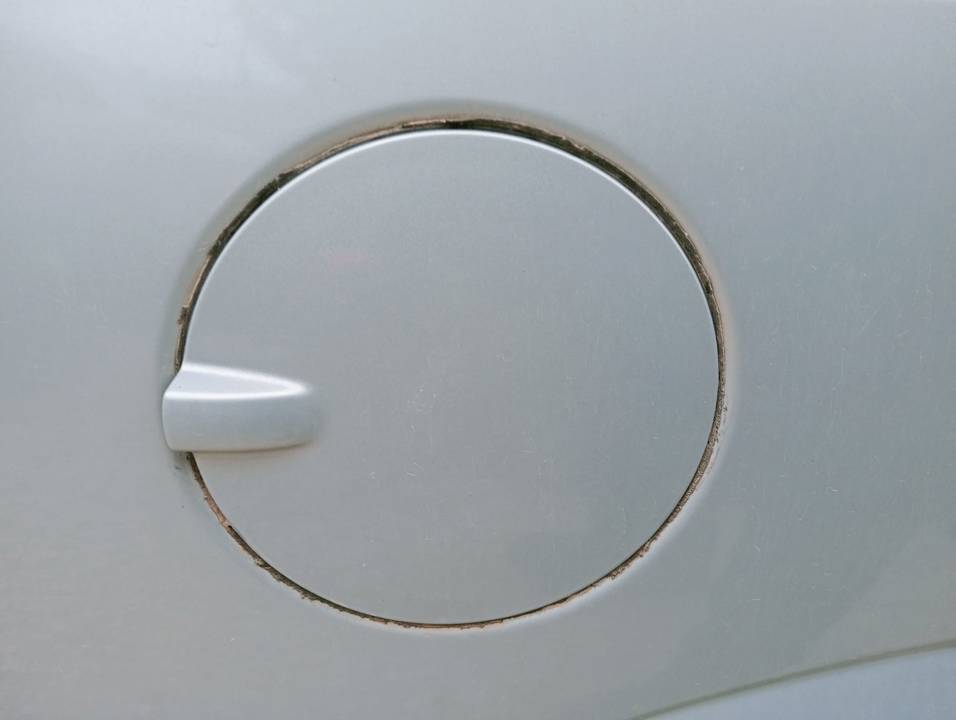 TAPA EXTERIOR COMBUSTIBLE