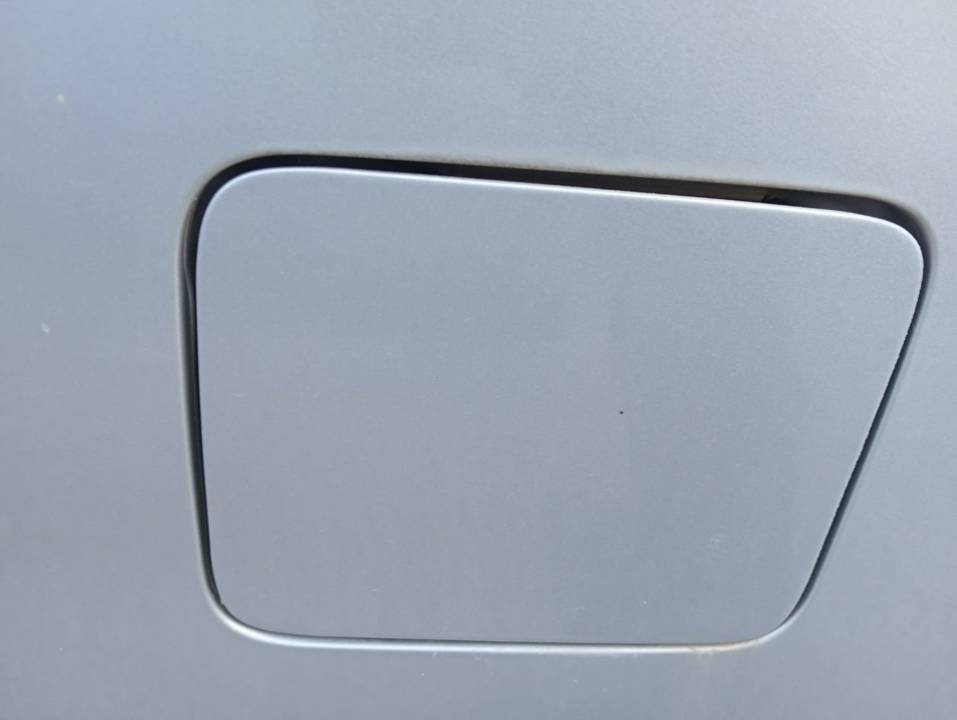 TAPA EXTERIOR COMBUSTIBLE