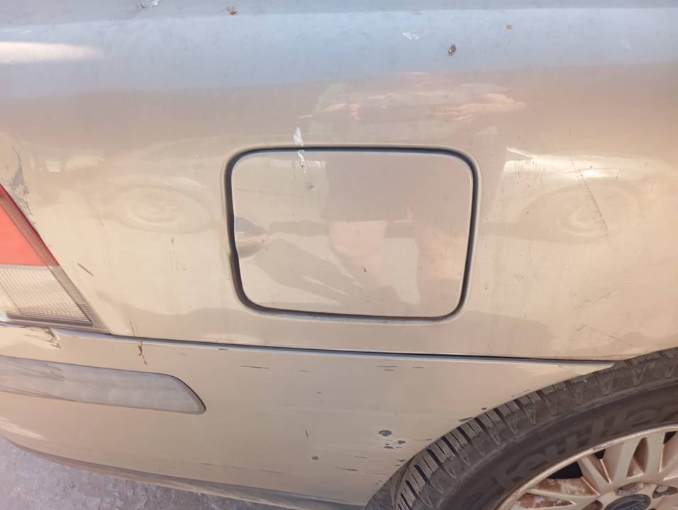 TAPA EXTERIOR COMBUSTIBLE