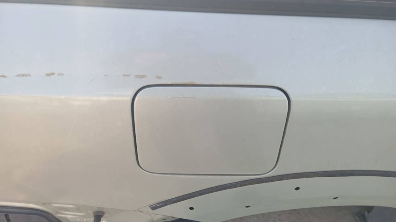 TAPA EXTERIOR COMBUSTIBLE