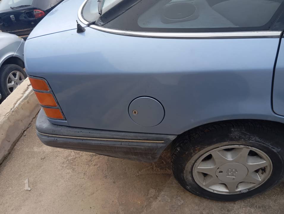TAPA EXTERIOR COMBUSTIBLE