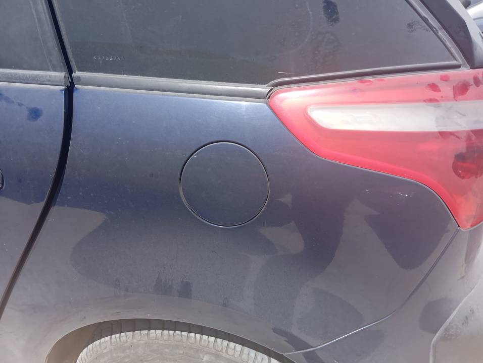 TAPA EXTERIOR COMBUSTIBLE