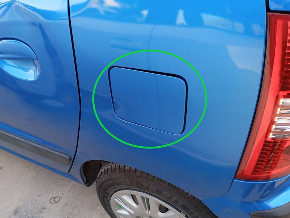 TAPA EXTERIOR COMBUSTIBLE