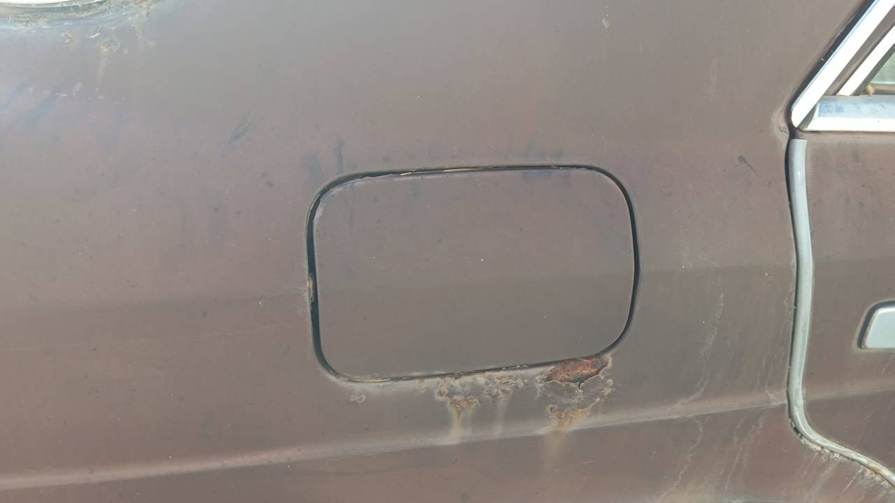 TAPA EXTERIOR COMBUSTIBLE