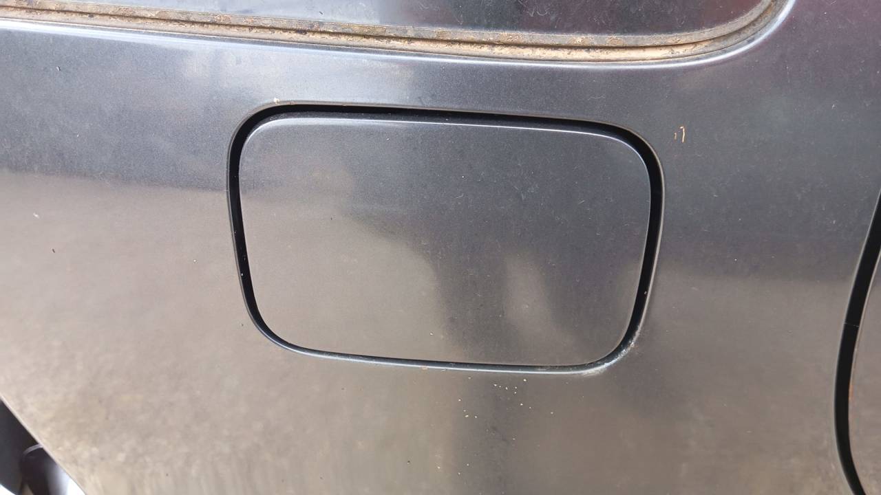TAPA EXTERIOR COMBUSTIBLE