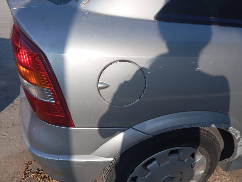 TAPA EXTERIOR COMBUSTIBLE