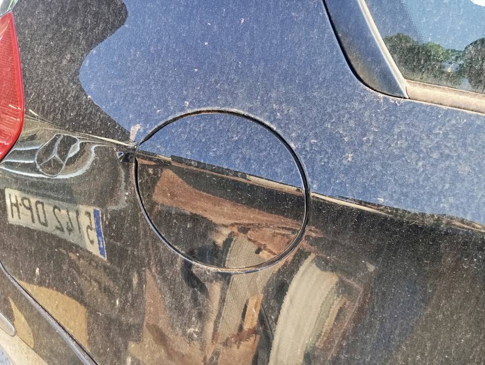 TAPA EXTERIOR COMBUSTIBLE