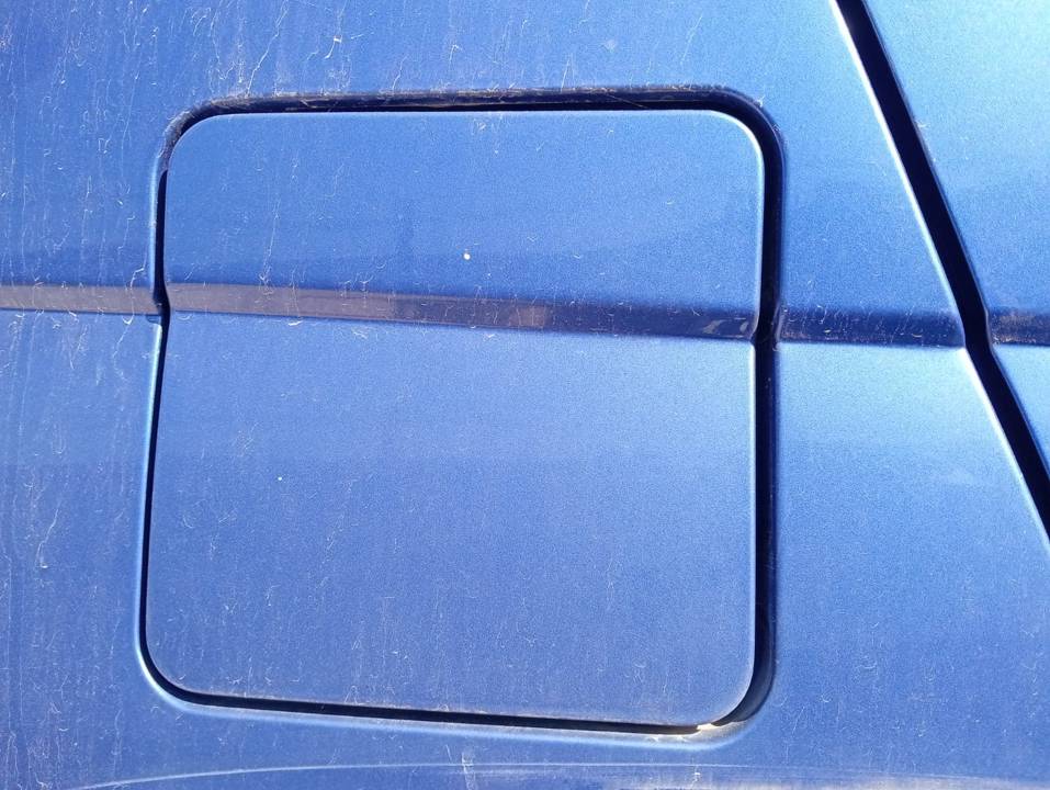 TAPA EXTERIOR COMBUSTIBLE