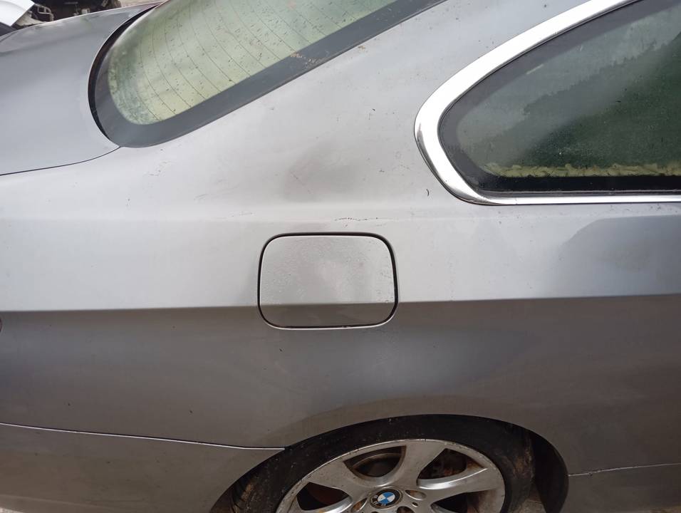 TAPA EXTERIOR COMBUSTIBLE