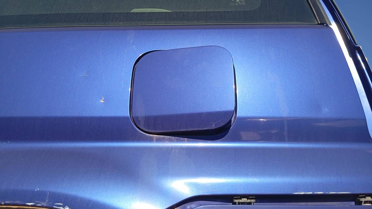TAPA EXTERIOR COMBUSTIBLE