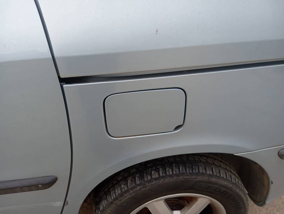 TAPA EXTERIOR COMBUSTIBLE