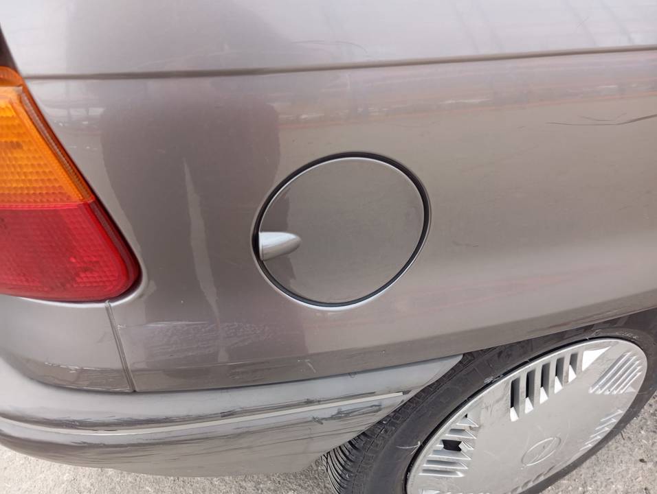 TAPA EXTERIOR COMBUSTIBLE