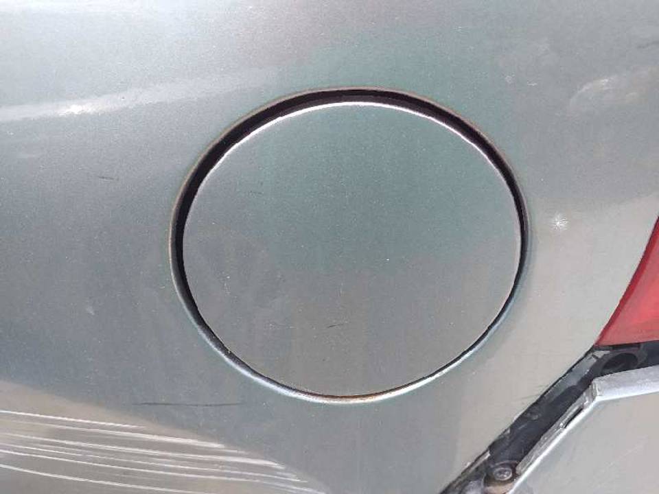 TAPA EXTERIOR COMBUSTIBLE