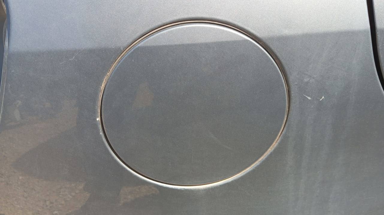 TAPA EXTERIOR COMBUSTIBLE