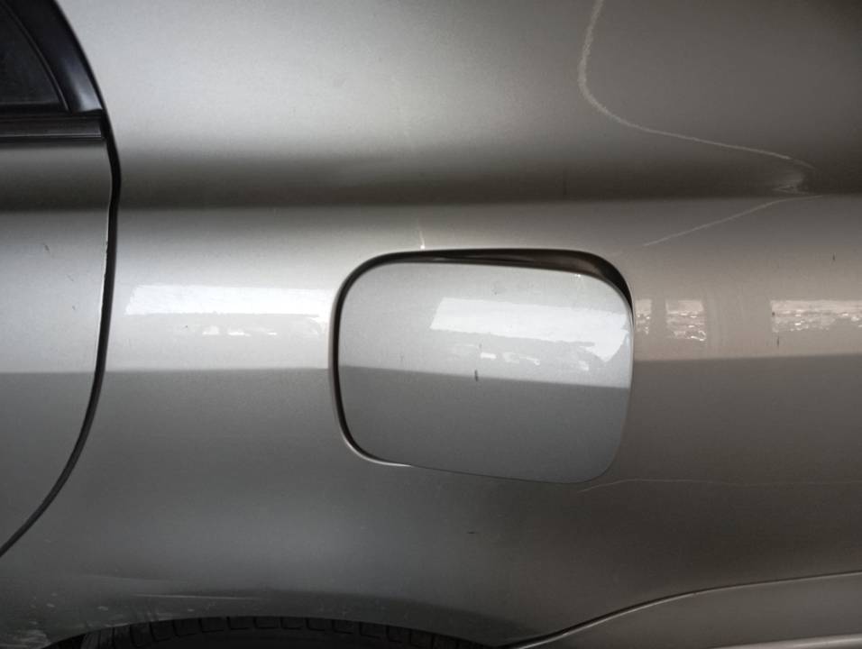 TAPA EXTERIOR COMBUSTIBLE