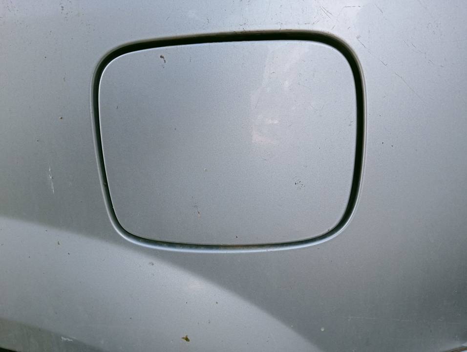 TAPA EXTERIOR COMBUSTIBLE
