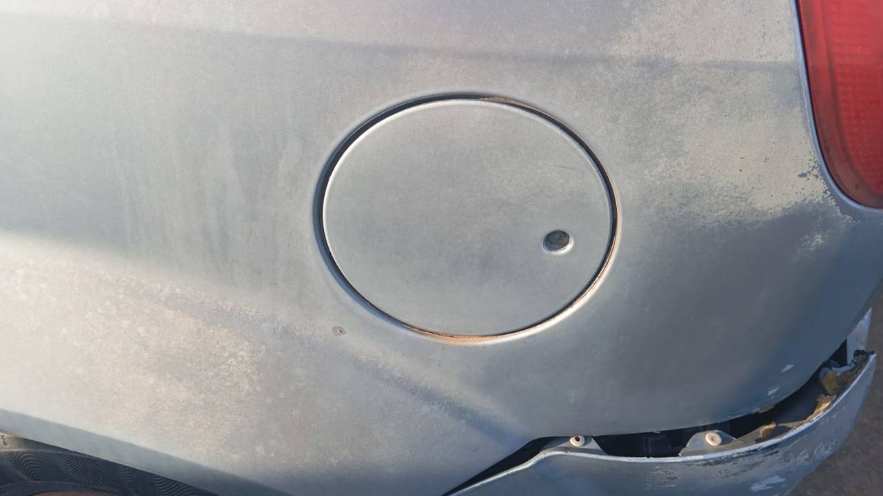 TAPA EXTERIOR COMBUSTIBLE