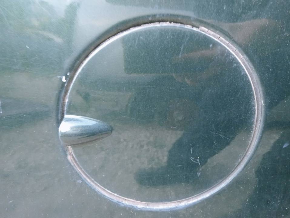 TAPA EXTERIOR COMBUSTIBLE
