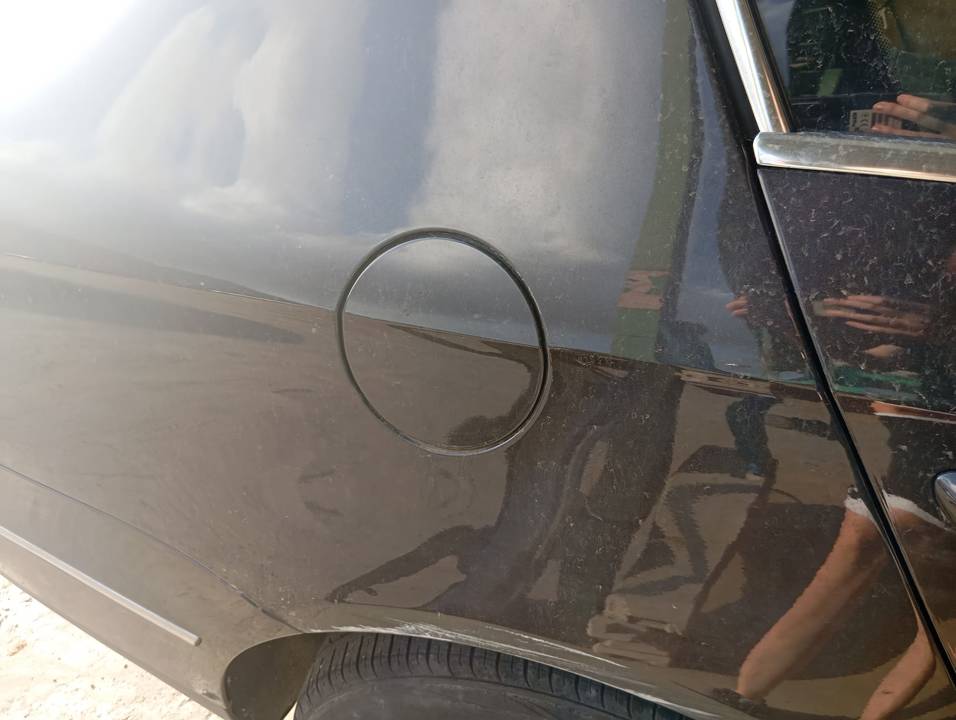 TAPA EXTERIOR COMBUSTIBLE