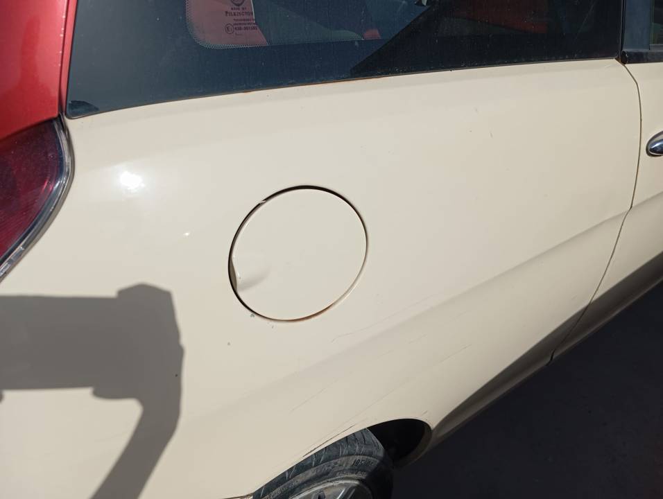 TAPA EXTERIOR COMBUSTIBLE