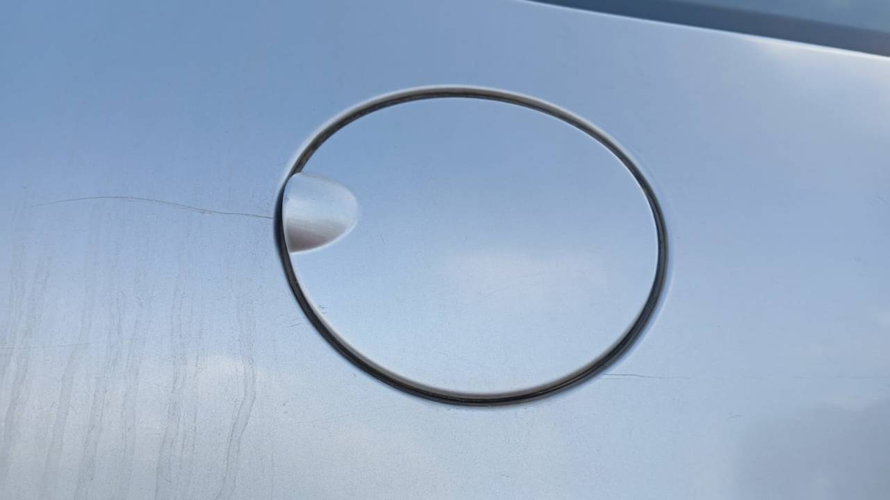 TAPA EXTERIOR COMBUSTIBLE
