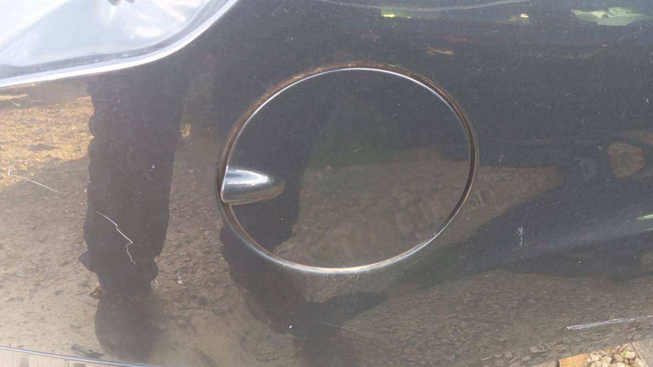 TAPA EXTERIOR COMBUSTIBLE
