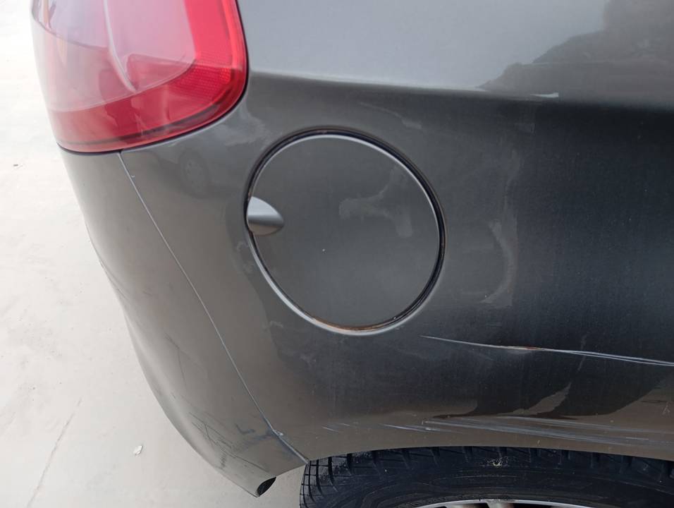 TAPA EXTERIOR COMBUSTIBLE