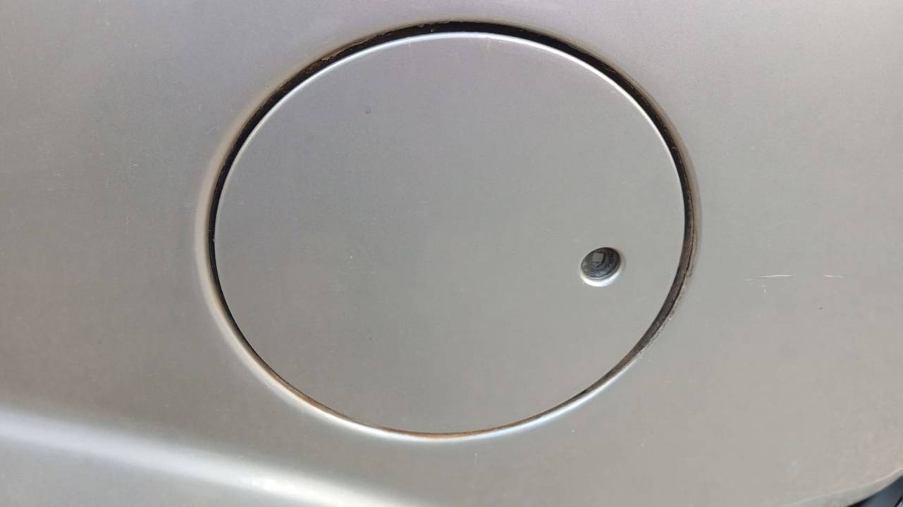 TAPA EXTERIOR COMBUSTIBLE