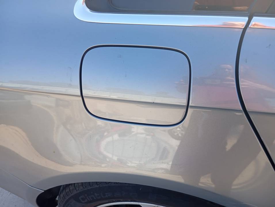 TAPA EXTERIOR COMBUSTIBLE