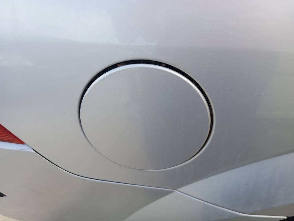 TAPA EXTERIOR COMBUSTIBLE
