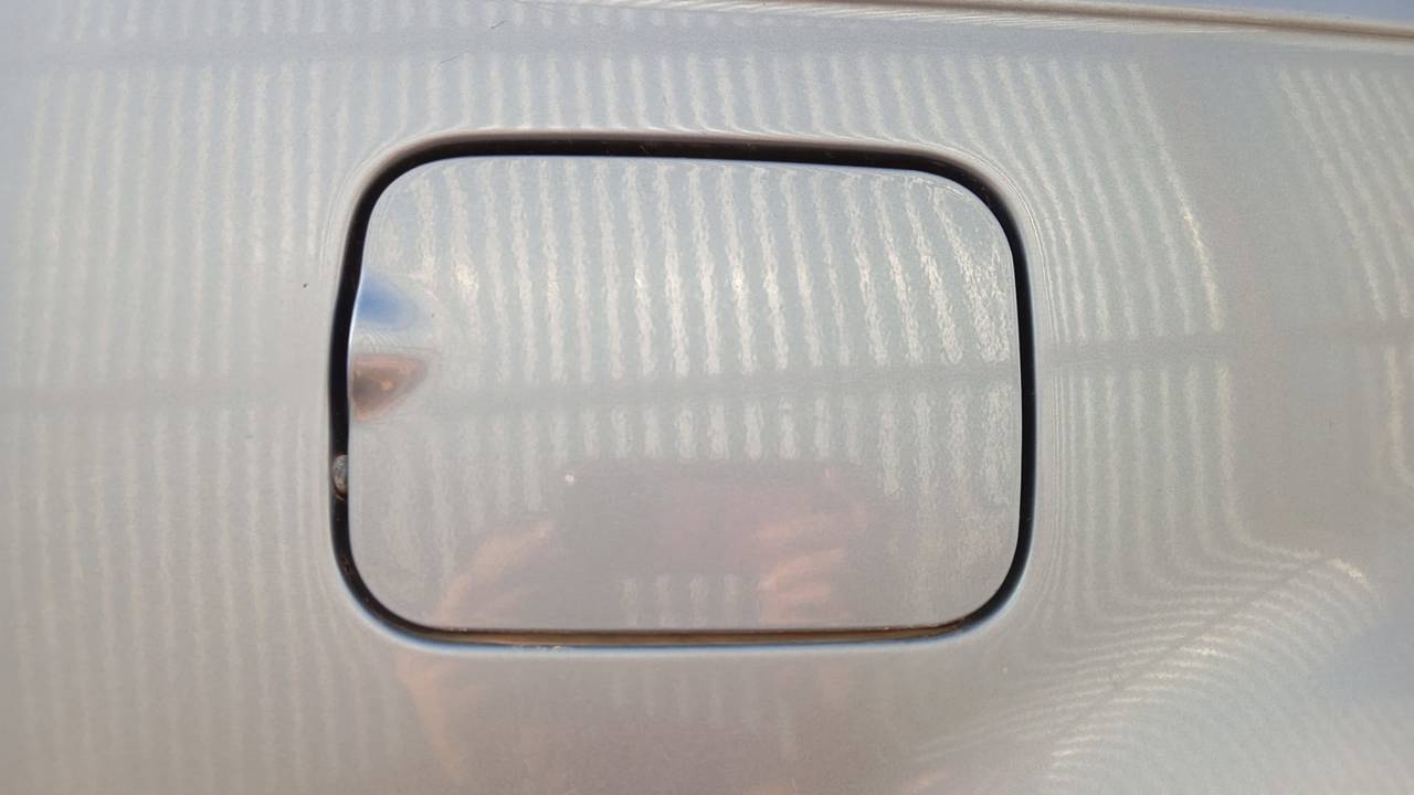 TAPA EXTERIOR COMBUSTIBLE