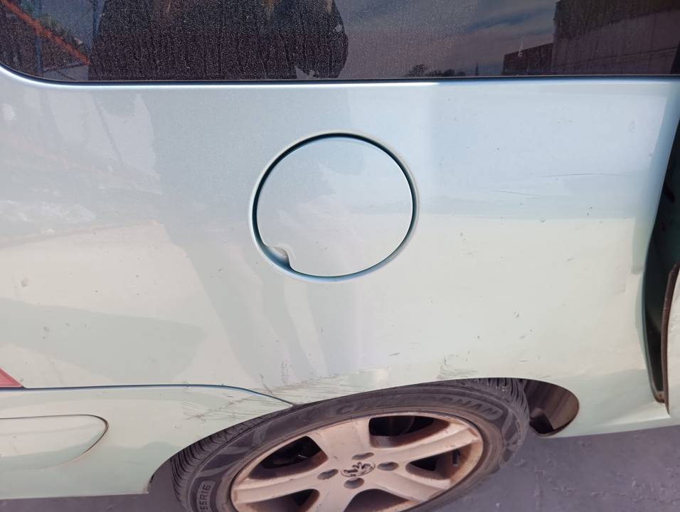 TAPA EXTERIOR COMBUSTIBLE