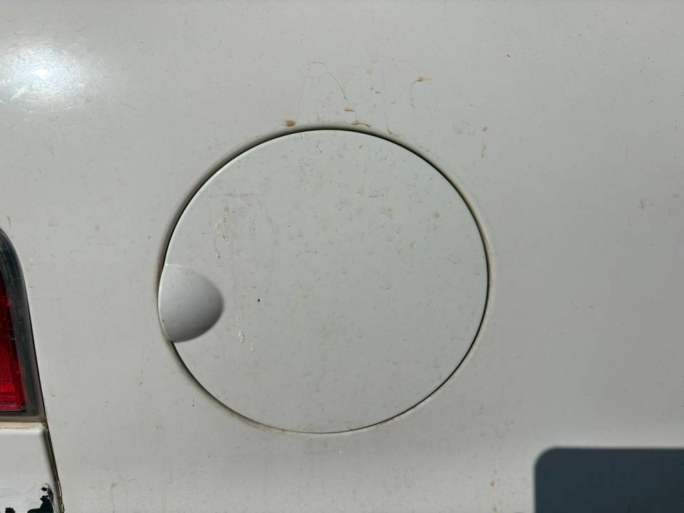 TAPA EXTERIOR COMBUSTIBLE