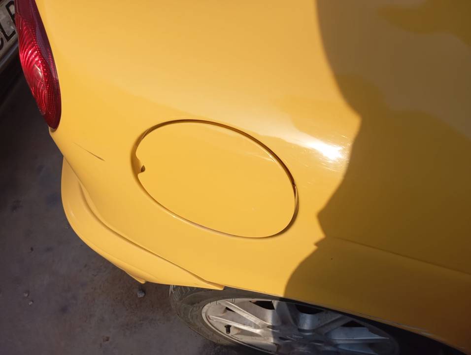 TAPA EXTERIOR COMBUSTIBLE