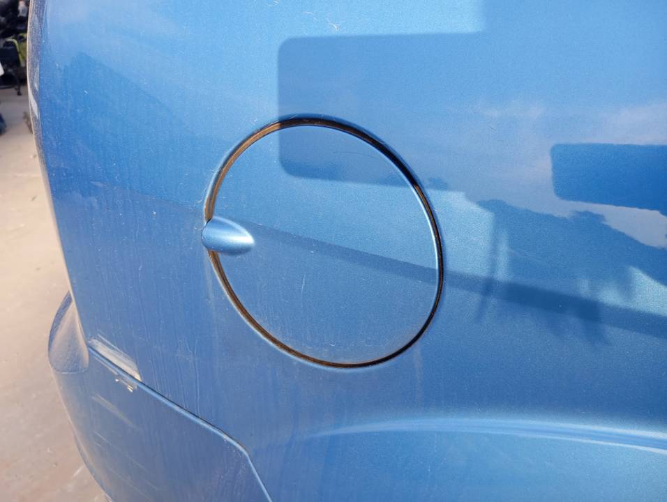 TAPA EXTERIOR COMBUSTIBLE