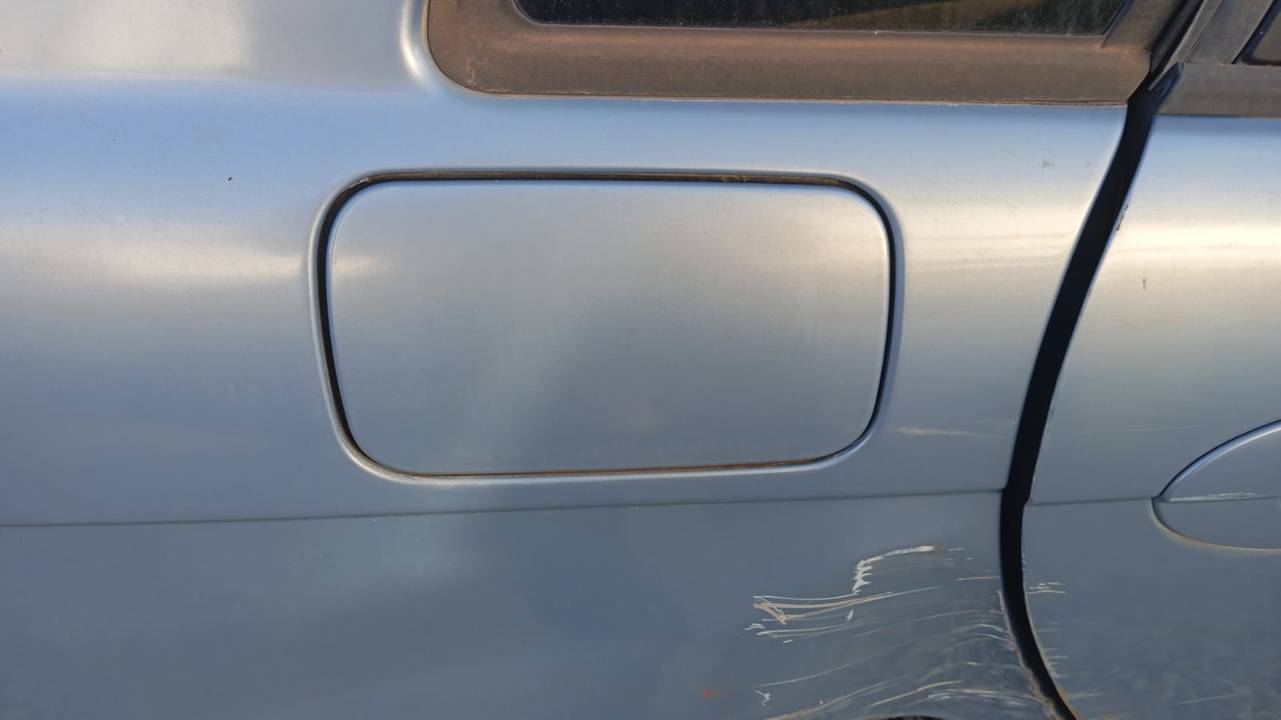 TAPA EXTERIOR COMBUSTIBLE