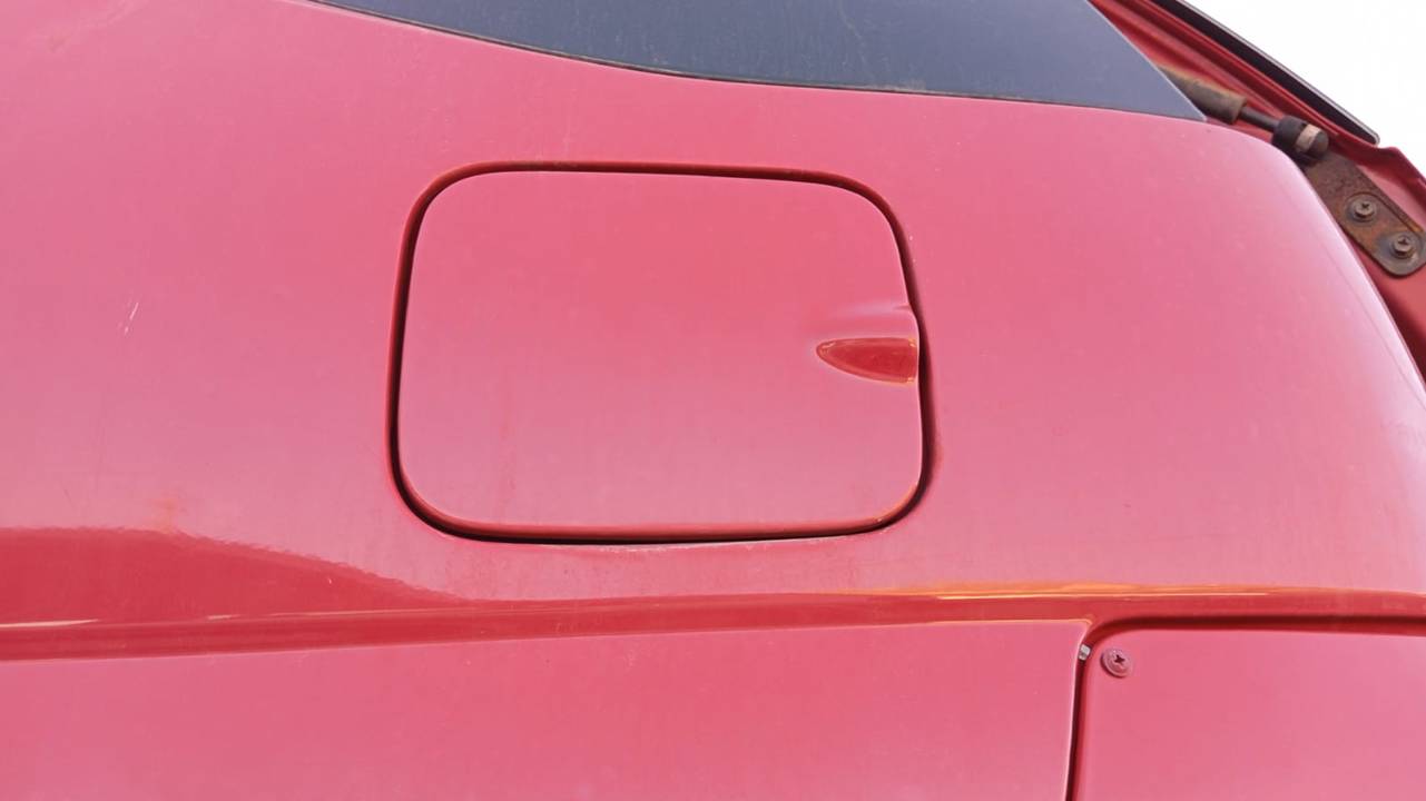 TAPA EXTERIOR COMBUSTIBLE