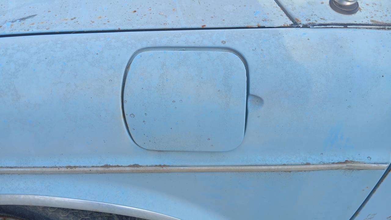 TAPA EXTERIOR COMBUSTIBLE