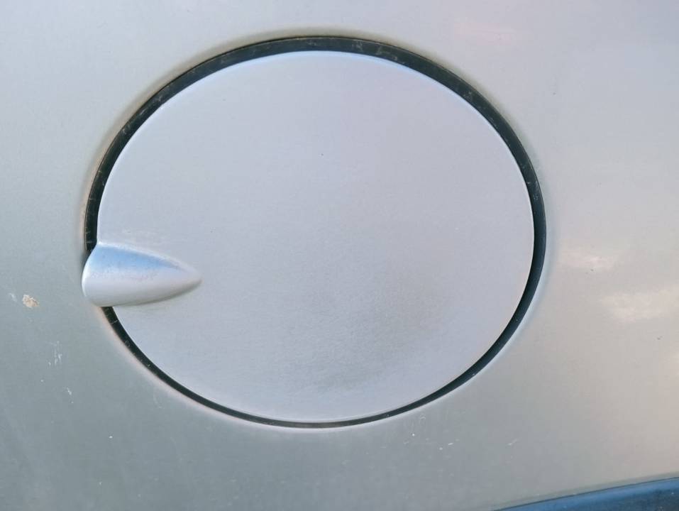 TAPA EXTERIOR COMBUSTIBLE