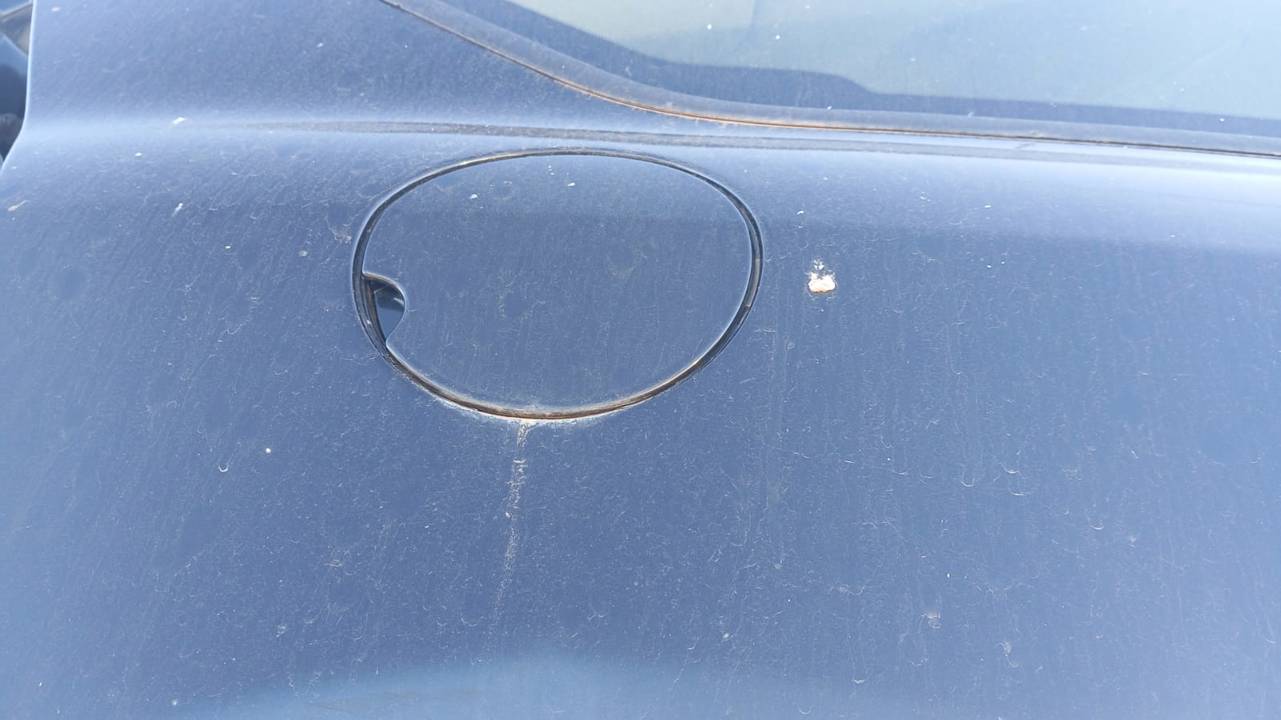 TAPA EXTERIOR COMBUSTIBLE