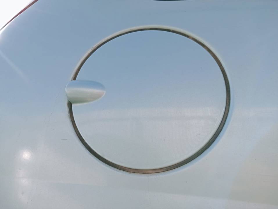 TAPA EXTERIOR COMBUSTIBLE