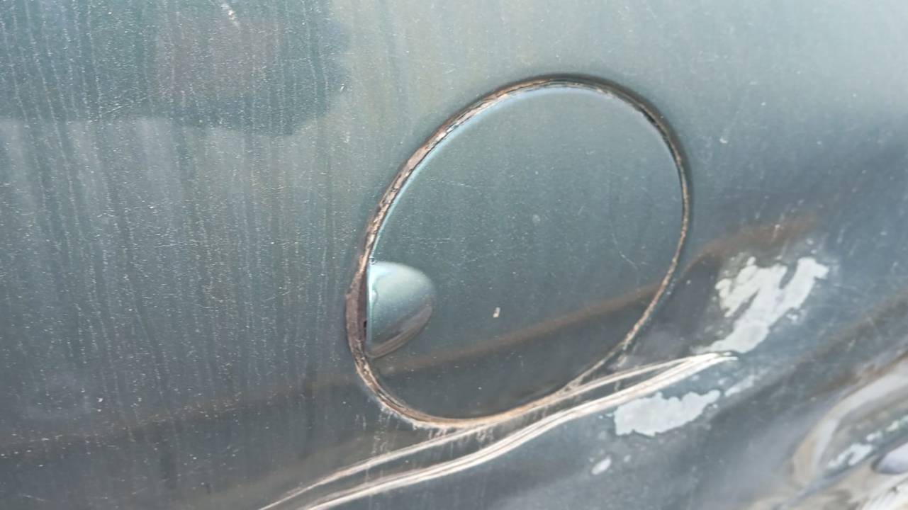 TAPA EXTERIOR COMBUSTIBLE
